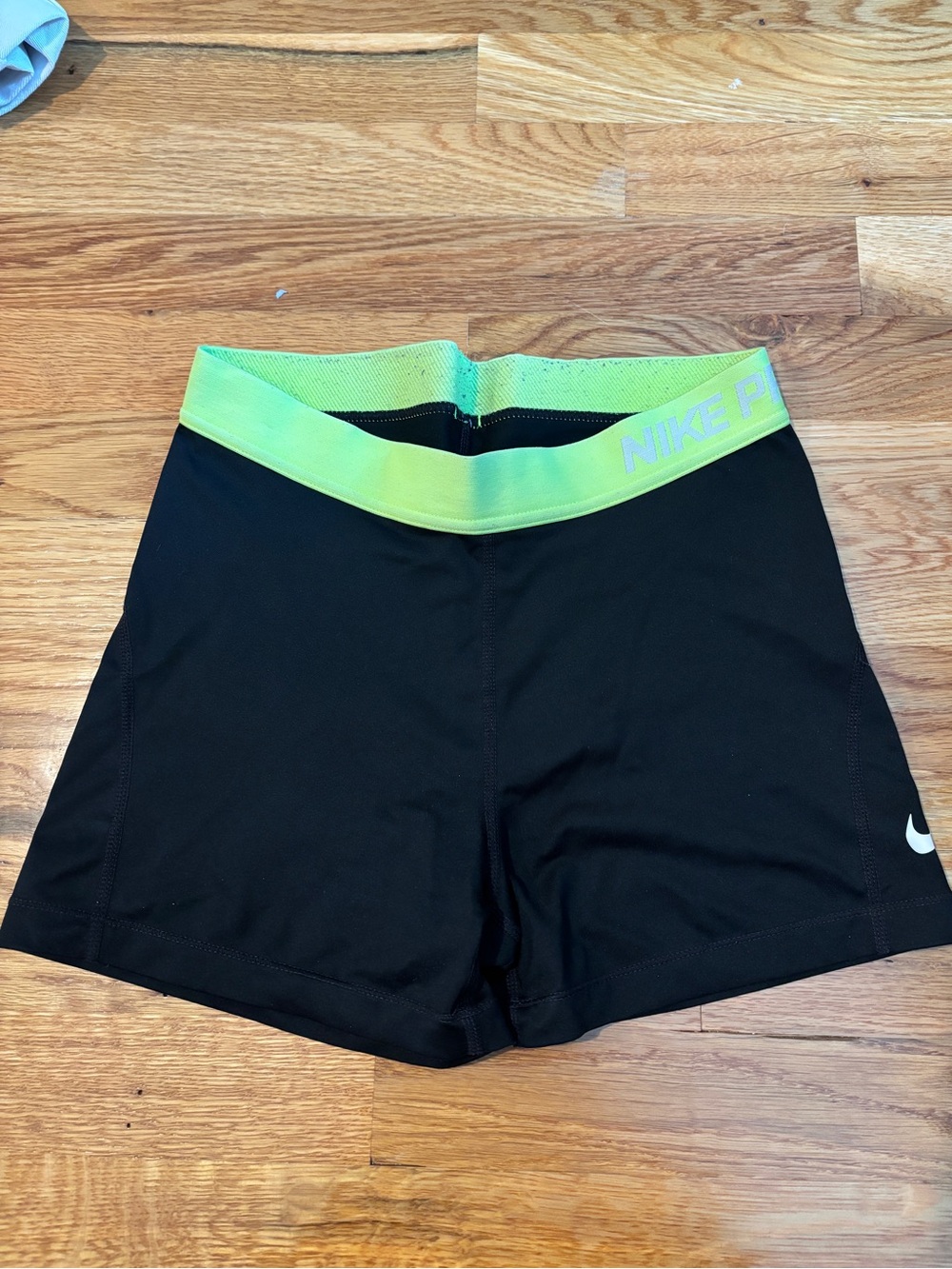Nike Women's Black Athletic Shorts with Neon Green Waistband